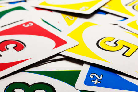 Umea, Norrland Sweden - February 16, 2020: card games with different numbers are randomly placed on the tableのeditorial素材