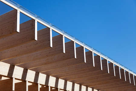 detail from roof belonging to large bus stop in city