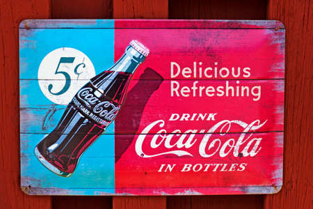 Skelleftea Norrland Sweden - August 8, 2020: an old billboard for a famous soft drink companyのeditorial素材