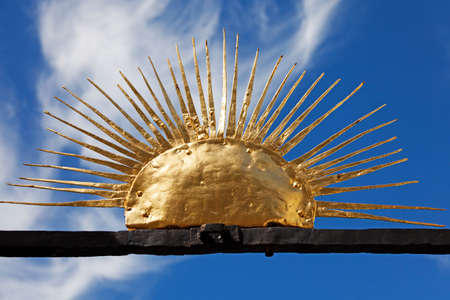 Skelleftea Norrland Sweden - August 8, 2020: a sun symbol up on the gate of a churchのeditorial素材