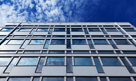 Umea, Norrland Sweden - June 8, 2020: beautiful summer sky reflected in a tall modern buildingのeditorial素材