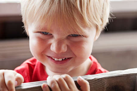 Umea, Norrland Sweden - August 30, 2020: mischievous guy under rain protectionのeditorial素材