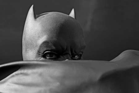 Umea, Norrland Sweden - September 5, 2020: Batman hides parts of his face in his cloakのeditorial素材