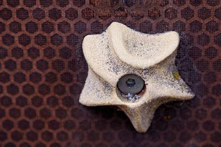 climbing grip star shape with sand at playground