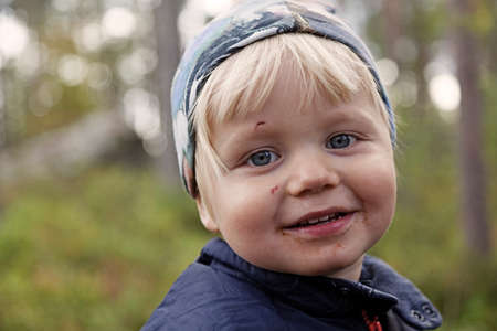 Umea, Norrland Sweden - September 27, 2019: a little boy out in the woodsのeditorial素材
