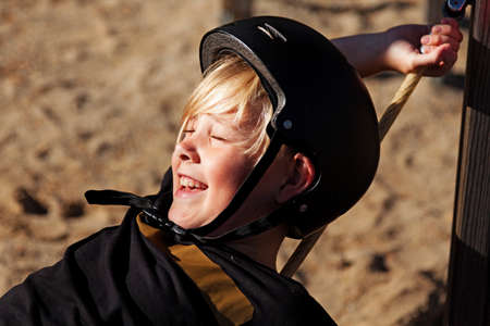 Umea, Norrland Sweden - September 20, 2020: young guy with bicycle helmet laughs with happiness