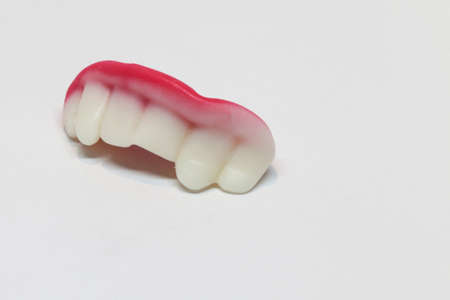 candy teeth on white background