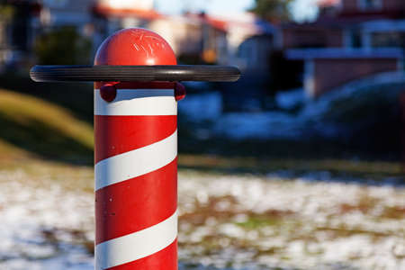 part of a swing for many children at the playgroundの写真素材