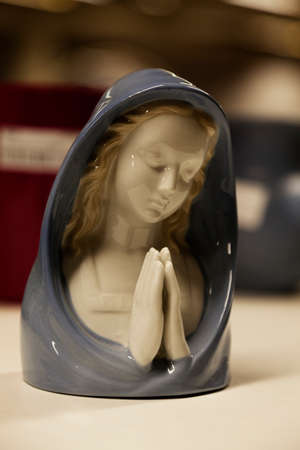 a statue of Mary praying found at a flea market