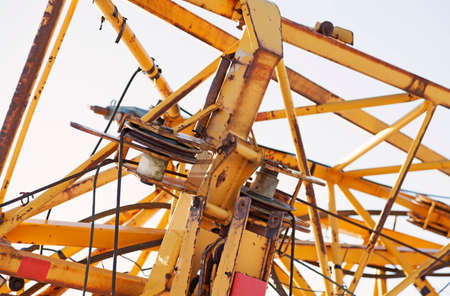 part of a yellow folded construction craneの写真素材