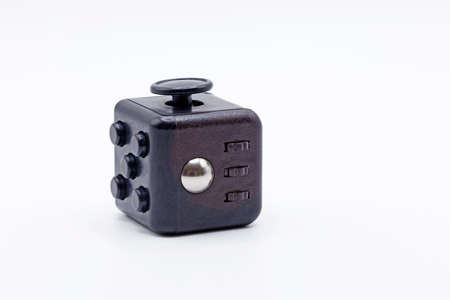 a cube with buttons and other things to reduce stress