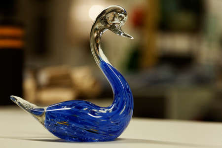 Umea, Norrland Sweden - June 21, 2020: glass swan found at flea marketのeditorial素材
