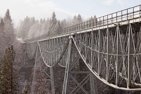 Umea, Norrland Sweden - May 1, 2021: old steel bridge for cars across the riverのeditorial素材