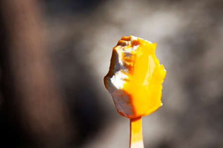 mango ice cream that someone has eaten