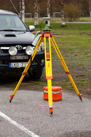 Umea, Norrland Sweden - April 20, 2021: laser meter on tripod used in constructionのeditorial素材
