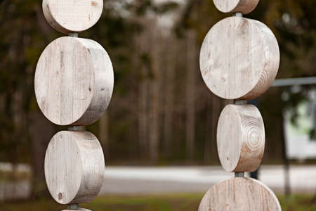 round wooden boards as decoration at the outdoor gymの写真素材
