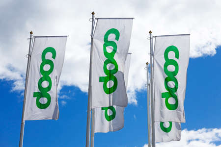 Umea, Norrland Sweden - June 7, 2021: Coop flags outside grocery storeのeditorial素材