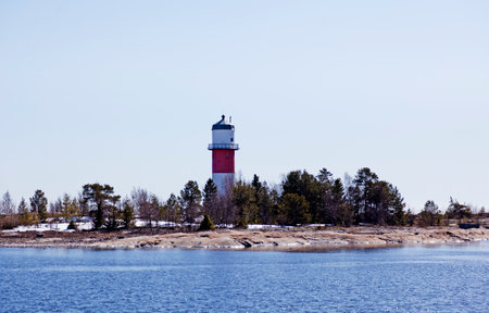 Holmsund, Norrland Sweden - April 24, 2022: lighthouse with open water all aroundのeditorial素材