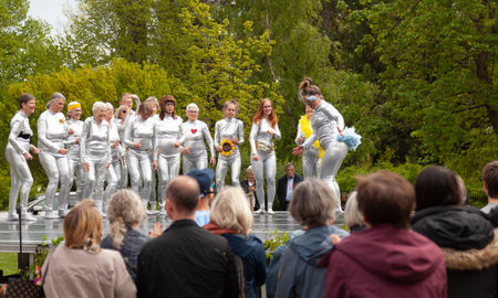 Umea, Sweden - June 6, 2023: elderly people during dance performance in parkのeditorial素材