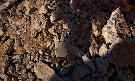 Detailed view of weathered rock surface showing natural textures and patternsの写真素材