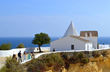 Senhora da Rocha, Algarve, Portugal - September 27, 2014: A romantic wedding ceremony in the sunのeditorial素材