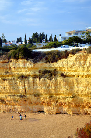 Senhora da Rocha Nova Beach, Algarve, Portugal - September 27, 2014: Tourists walking on the beachのeditorial素材