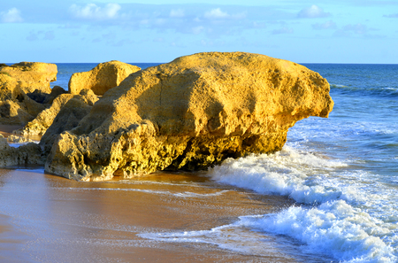 Spectacular rock formations on Praia Da Gale Beach on the Algarve coastの写真素材