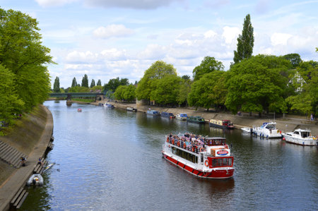 Tourists cruising along river Ouse in the City of Yorkのeditorial素材
