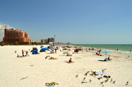 Tourists on the beach enjoying the sunのeditorial素材