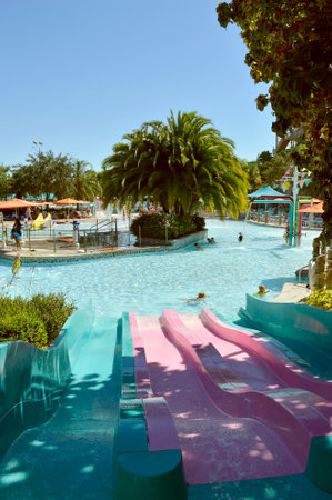 Tourists in Kata's Kookaburra Cove adventure play area in Aquatica water parkのeditorial素材