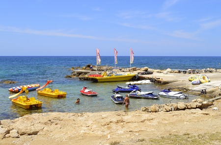 Boats for hire on Paphos Beach a tourist resort in Cyprusの写真素材
