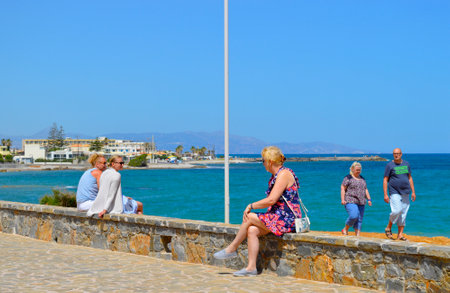 Tourists on Gouves coast in Crete the largest and most populated of the Greek islandsのeditorial素材