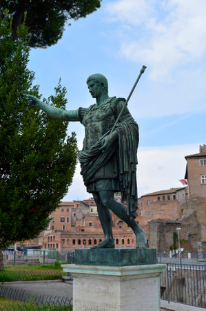 Bronze statue of Roman Emperor Augustus Caesar on Via dei Fori Imperiali street in the city. of Rome.のeditorial素材