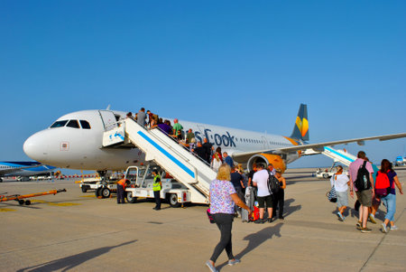 Fuerteventura, Canary Islands, Spain - September 22, 2018 : Passengers embarking form a Thomas Cook Airbus A320 aircraft in Fuerteventura airportのeditorial素材
