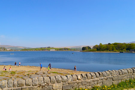 Hollingworth Lake, Littleborough, Rochdale, Greater Manchester; England; UK, Europe  - April 21, 2019 : Visitors at Hollingworth Lake in Rochdale in the spring sunshineのeditorial素材