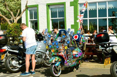 Hollingworth Lake, Littleborough, Rochdale, Greater Manchester; England; UK, Europe  - April 21, 2019 : Lambretta with mirrors parked outside a pub in Hollingworth Lake Country Parkのeditorial素材