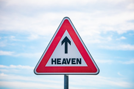 Roadsign with an arrow inside pointing to heavenの写真素材