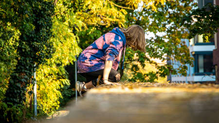 Girl climbing on a wall