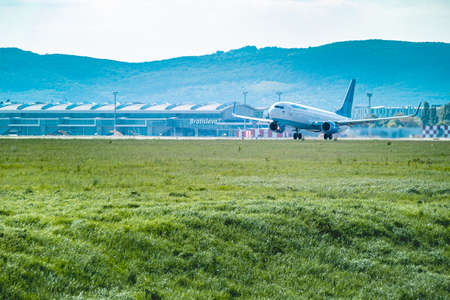 Pobeda Airline Aircraft Boeing 737-81DWL VQ-BTE lifting off Bratislava Airport on a sunny dayのeditorial素材