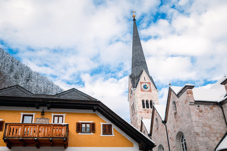 Church in Hallstatt on a sunny day in winterの写真素材