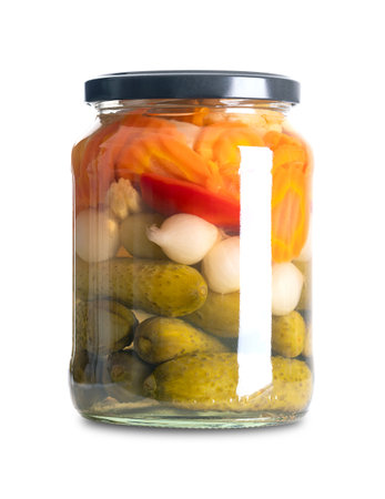 Mixed vegetables, pickled grill and barbecue mix in a glass jar. Carrots, pearl onions, bell peppers, baby corn and pickles, preserved in a brine of vinegar and salt.の写真素材