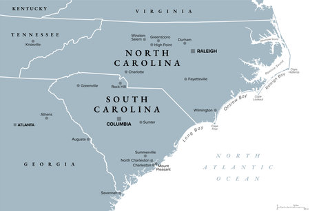 The Carolinas or simply Carolina, U.S. states North and South Carolina, gray political map, with borders and capitals Raleigh and Columbia.のイラスト素材