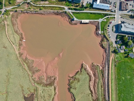Drone Aerial shot muddy plains at the edge of Annapolis in Canada Nova Scotia