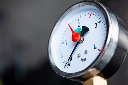 Pipes and gauge in heating and coopy space