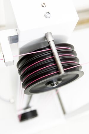manufacturing of wires for industrial use, with red cableの写真素材