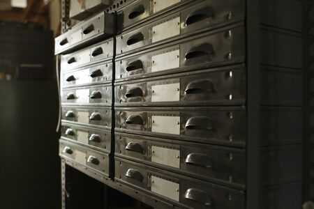 old filing in dirty dusty room with dramatic lightingの写真素材