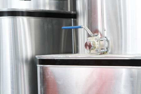chrome pipes in heating and AC rooms in buildings of factories and hospital. With silver metalの写真素材