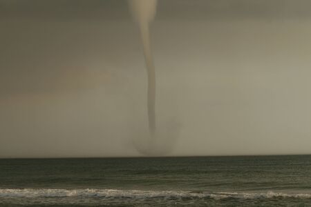 bad weather and storm with the wind on the sea. tornado over the ocean, nature force background -...