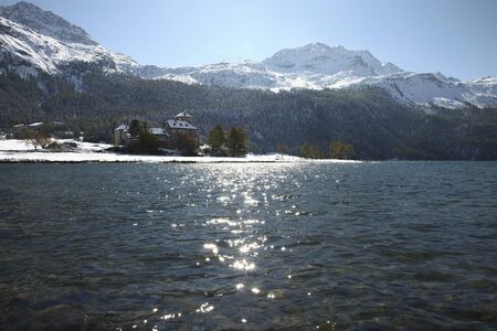 St. Moritz, Switzerland with lake and snowy mountains with blue skyの写真素材