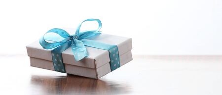 christmas presents with copy space with a ribbon bowの写真素材